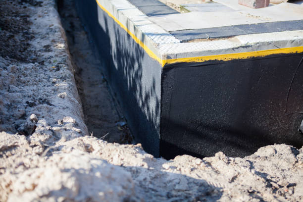 Professional Wet Basement Repair technician working in Patricksburg, IN